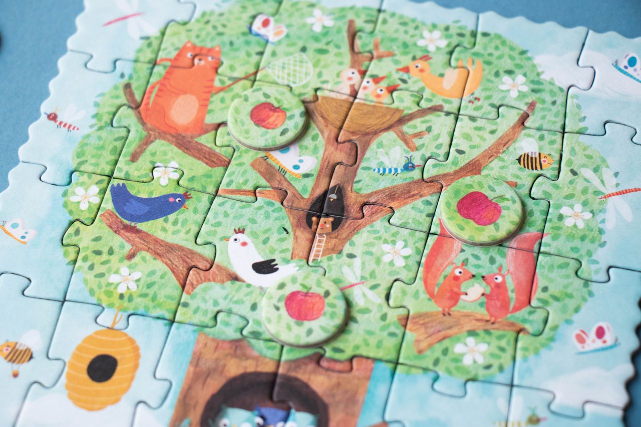 dettaglio del puzzle tascabile pommier