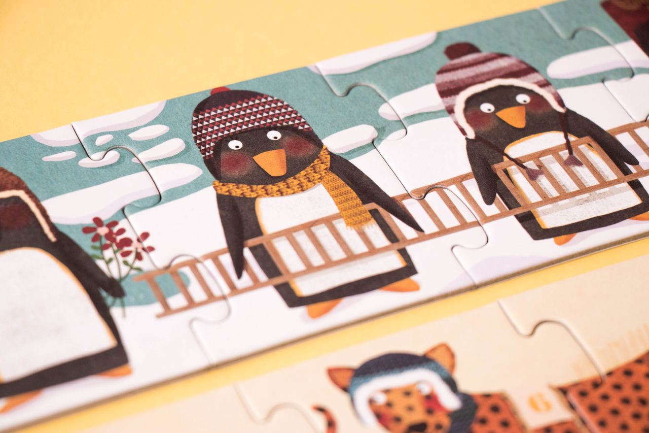 Dettaglio del puzzle 10 pinguini 