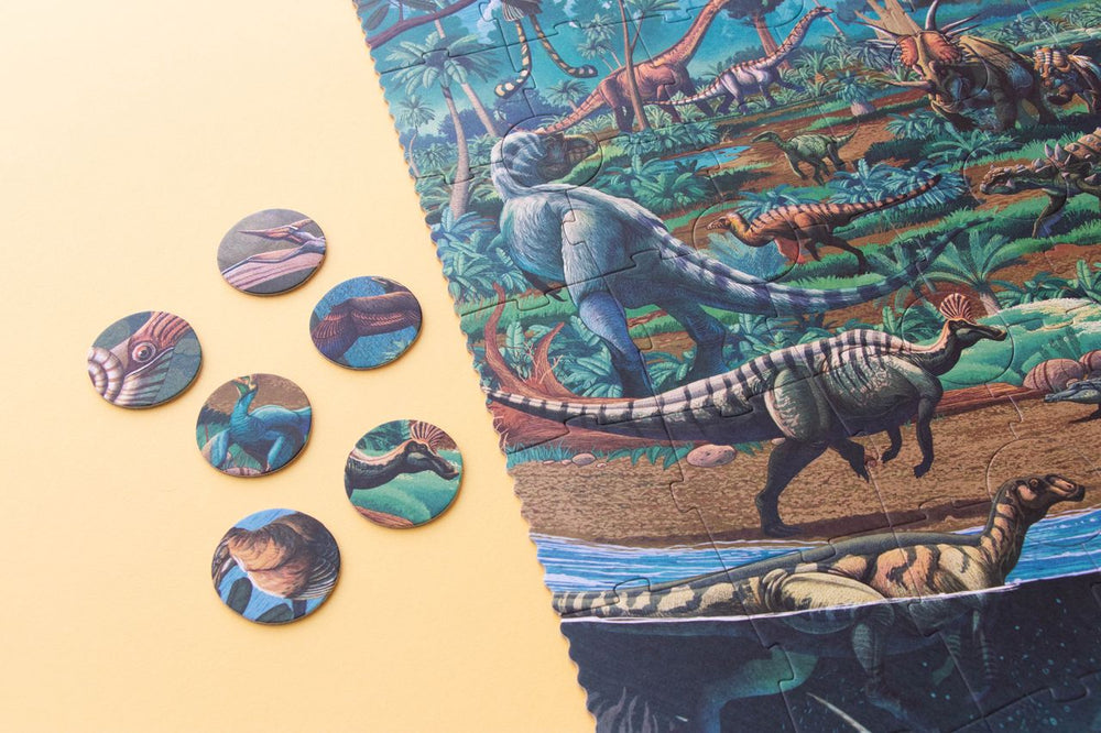 Dettaglio Puzzle Era dei Dinosauri e tesserine per imparare caratteristiche dei dinosauri