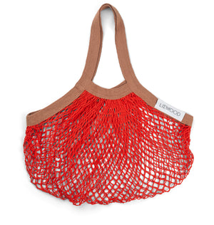 Borsina in rete di Liewood. Variante rossa con bordo marrone