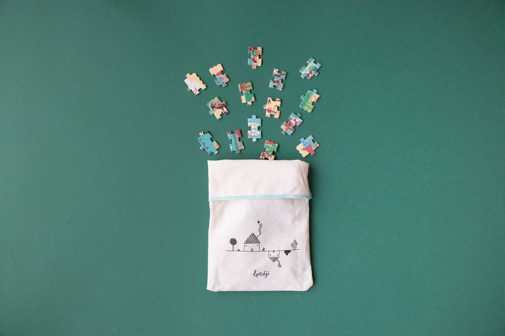 Sacchettino di stoffa contenente pezzi puzzle castle