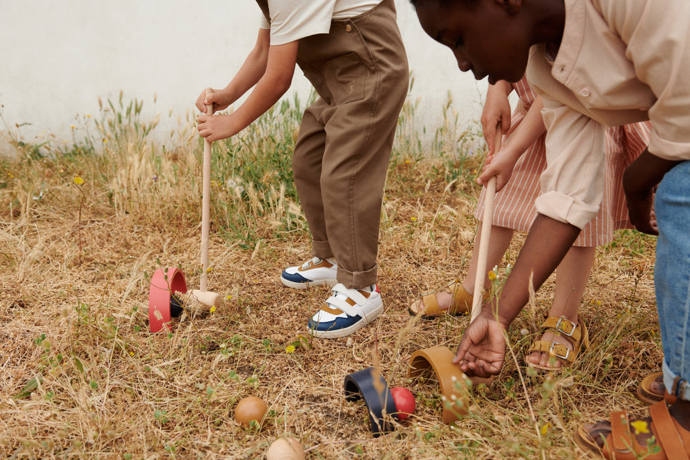 Gioco del Croquet, 100% legno di faggio, Liewood. Bambini che giocano nel prato con il set