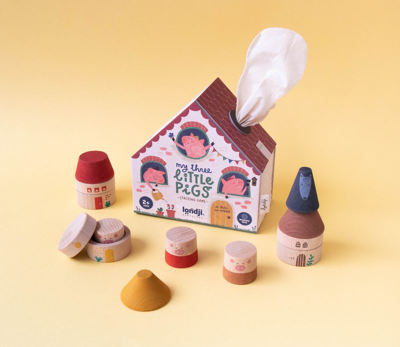 Scatola a forma di casetta di my 3 little pigs e pezzi di legno da impilare 