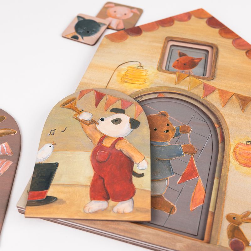 Dettaglio puzzle multistrato. finestrella con cane che suona la tromba