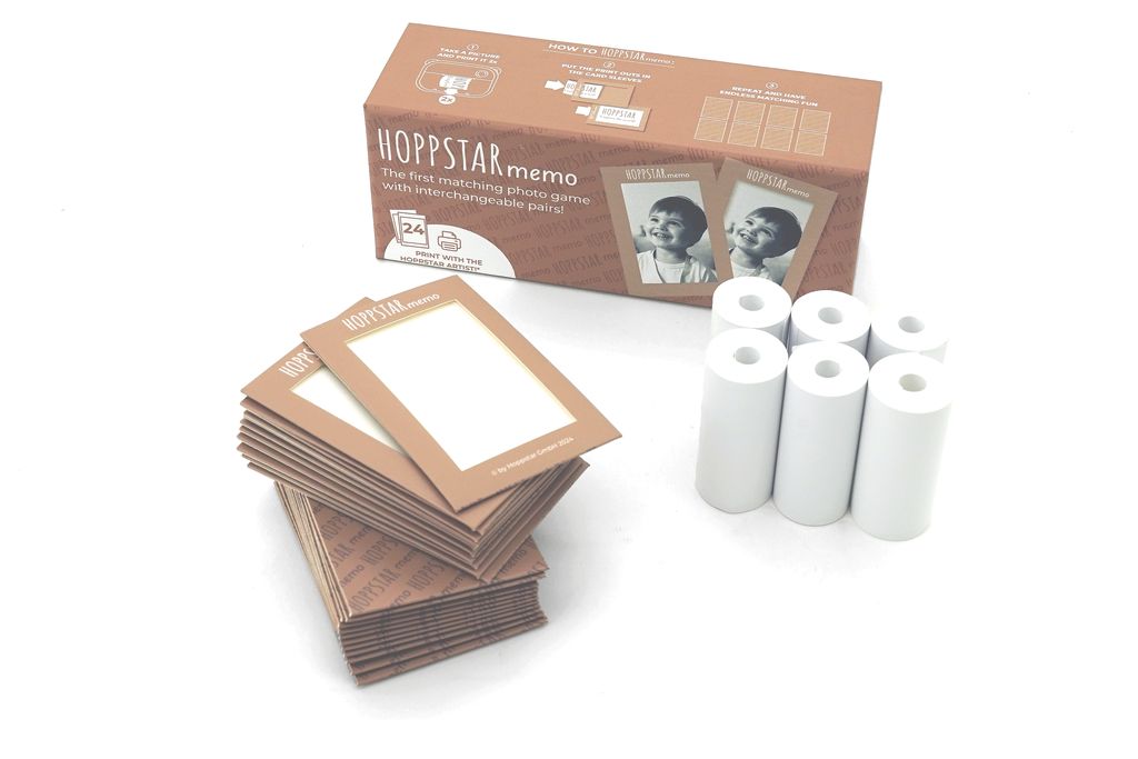 Packaging con 24 tesserine per inserire 12 coppie di foto stampate e sei rotolini