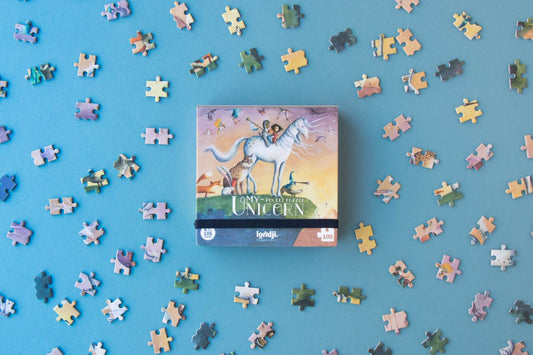 Packaging puzzle tascabile My Unicorn con pezzi intorno