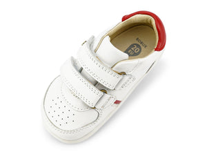 scarpa bianca con forellini aerazione in punta e due strap, tallone rosso
