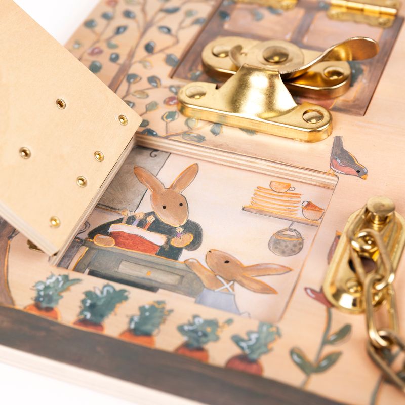 finestra aperta con coniglietti a tavola