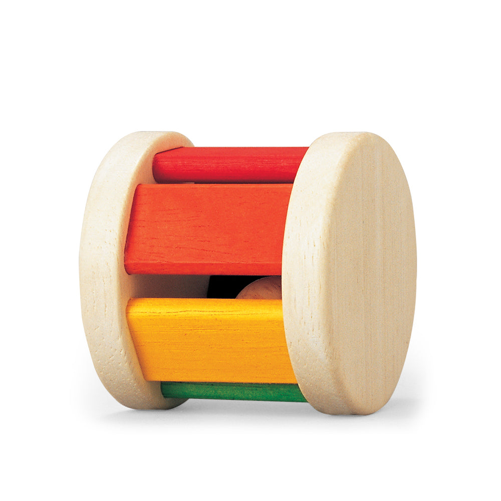 Sonaglio in legno "Roller", Plan Toys. Tasselli colorati con tinte accese: viola, blu, verde, rosso, giallo e arancione
