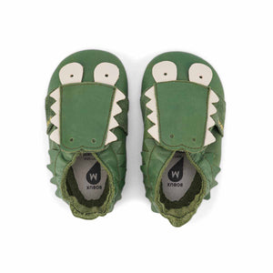 Bobux babbucce Soft Sole Coccodrillo Verde con dentini e occhi bianchi.