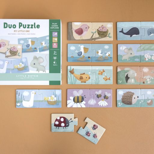 Duo Puzzle Fiori e Farfalle, Little Dutch. Confezione del gioco chiusa con accanto alcuni puzzle completati