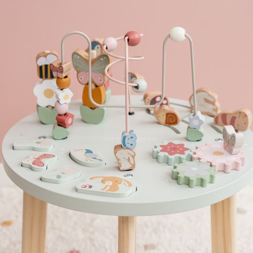 Activity Table, tavolino multiattività in legno, Little Dutch. Tavolino a tema Fiori e Farfalle con diversi giochi tra cui spirali, ingranaggi, puzzle. Il tavolino è rotondo e color verde chiaro pastello con gambe color legno marrone chiaro. I vari elementi richiamano il tema dei fiori e delle farfalle con uccellini, coniglietti, api, fiori ecc...
