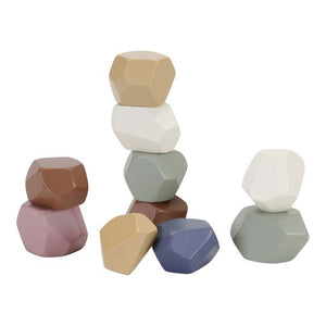 Stacking Stones, Pietre impilabili in legno, Little Dutch. 10 pietre di varie dimensioni e colori poste sul tavolo