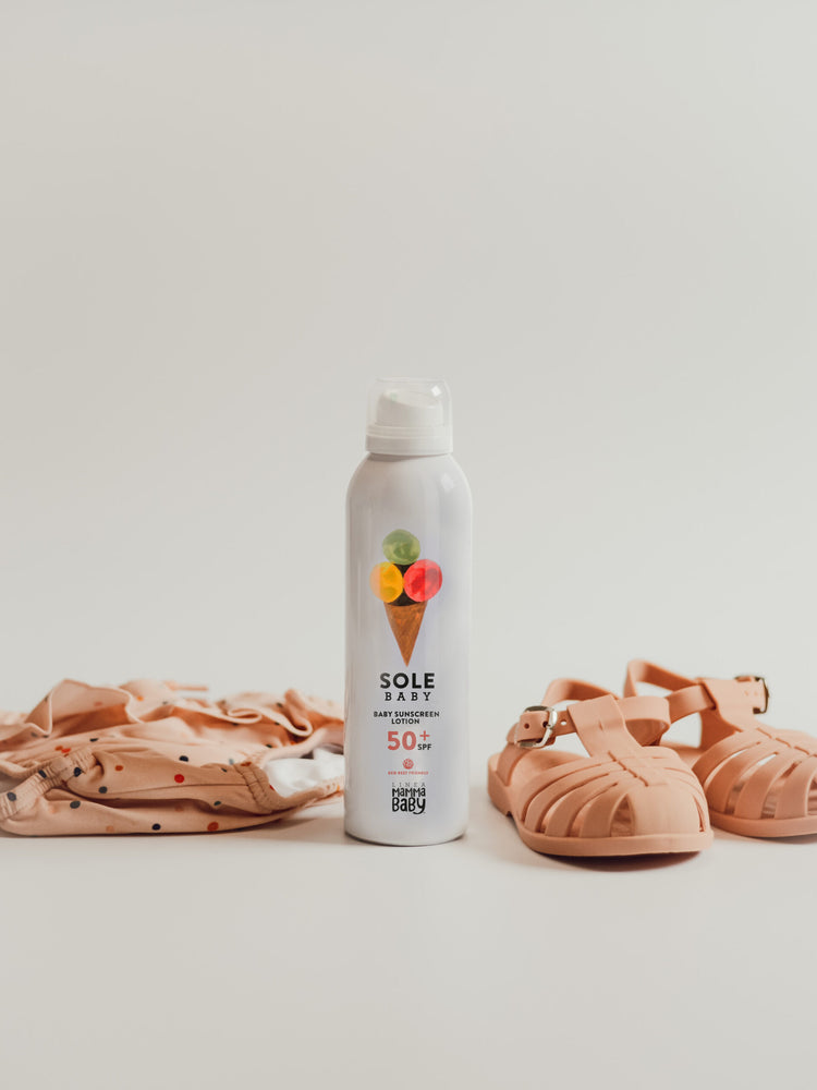 Solare bimbi SPF 50 + Eco Reef, Linea Mamma Baby. Vista del prodotto in contenitore bianco con stampa cono gelato