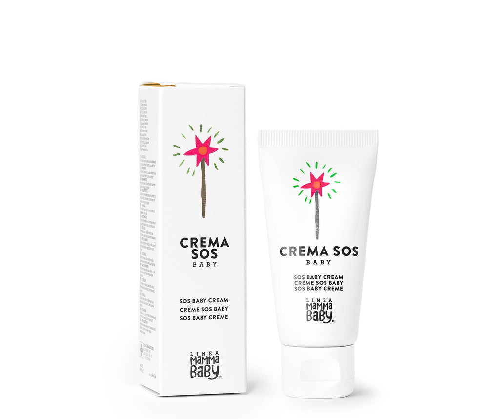 Crema SOS Baby, Linea Mamma Baby, 30 ml. Vista del tubetto bianco con disegno di una bacchetta magica rossa e verde e relativa confezione in cartone bianco.